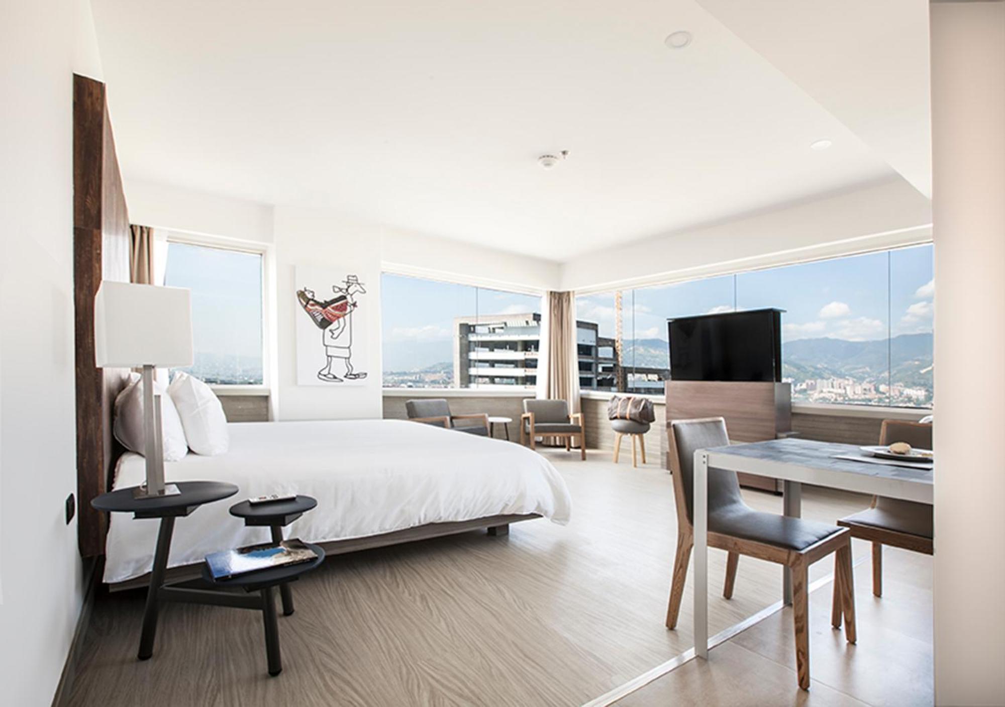 Suite con vistas a la ciudad y cama extragrande